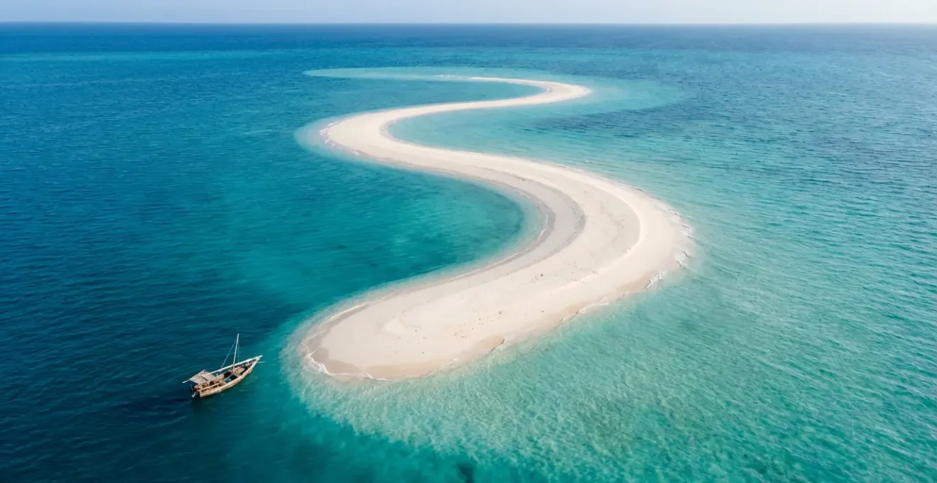 Aerial view of Philippines' longest sandbar emerging from turquoise waters during low tide