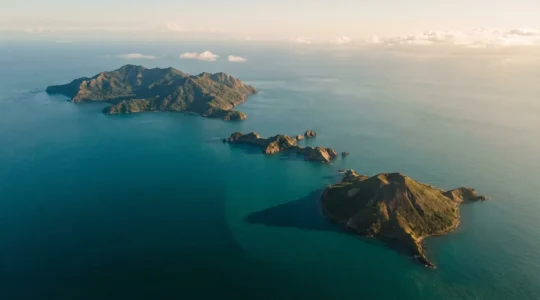 Aerial view showcasing the three major Philippine island groups with distinct landscapes